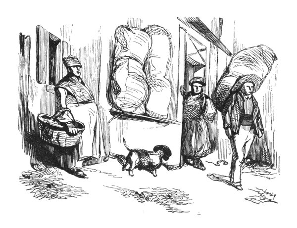 Planche à charbon à la porte d’un marchand de vins