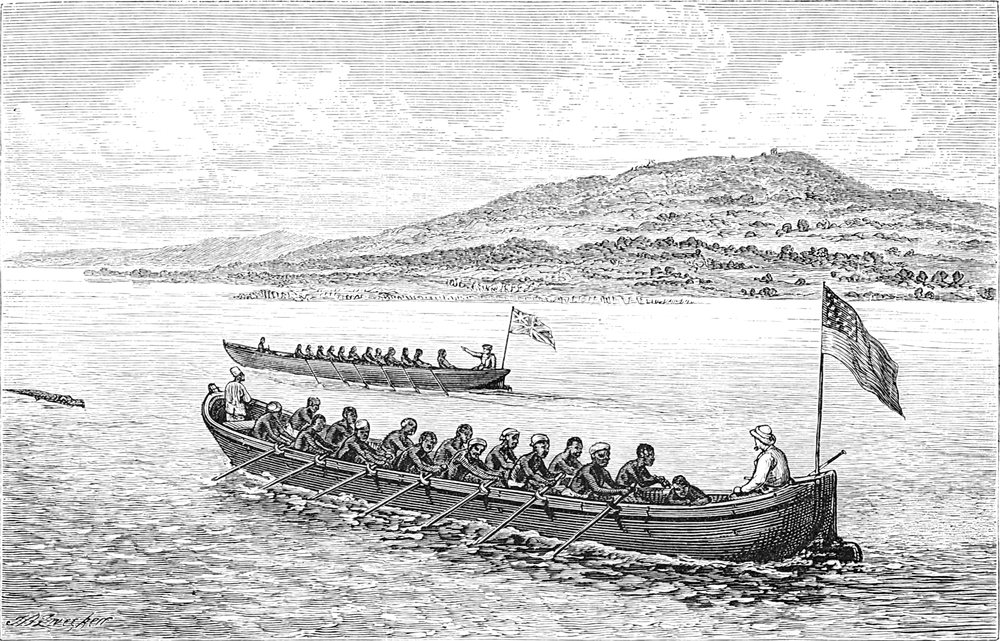 Zwei große Ruderboote   mit britischer und amerikanischer Flagge