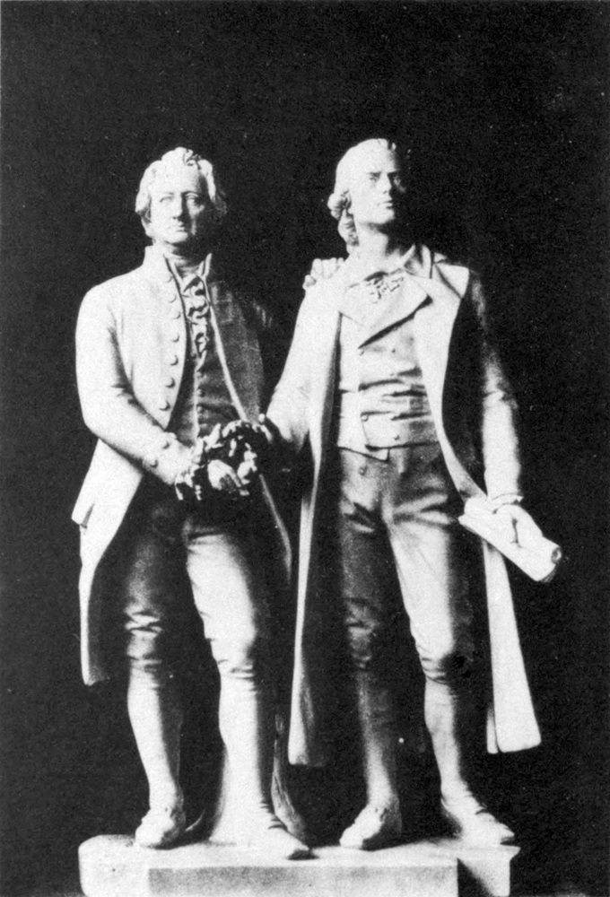 Statue of Goethe and   Schiller, taking hold of a laurel wreath