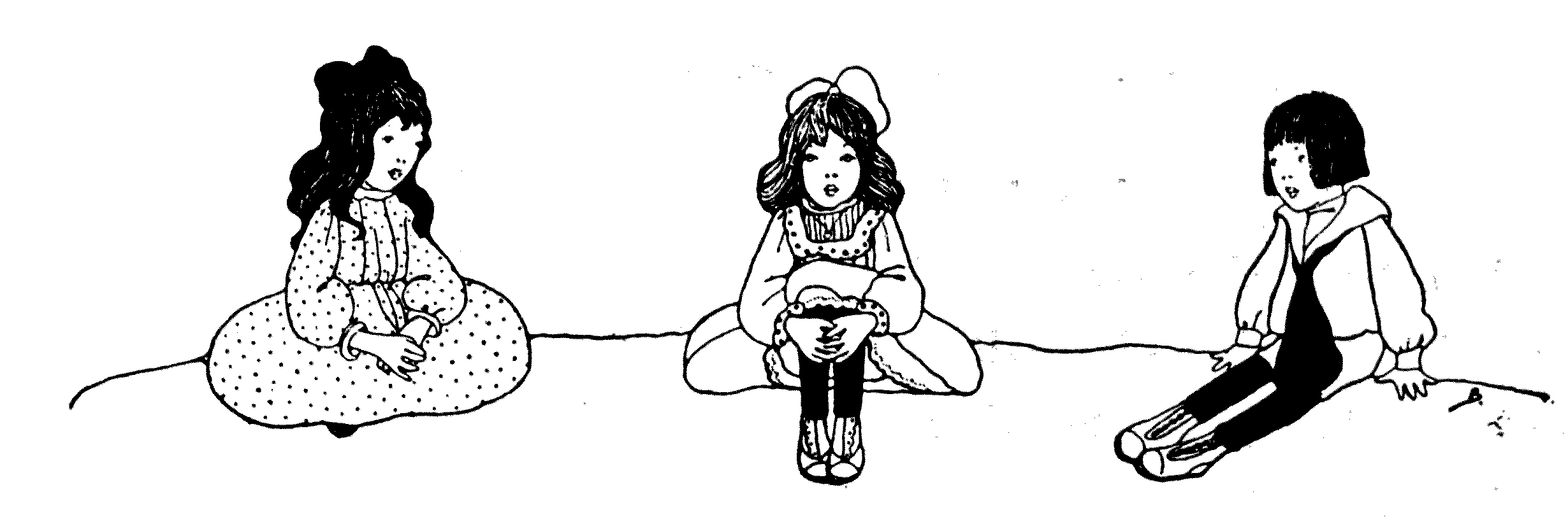 three children sitting on the ground
