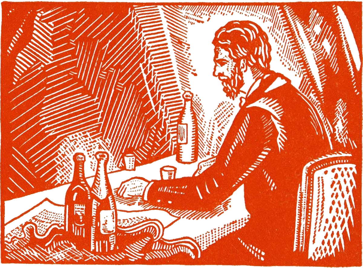 Man at table with bottles