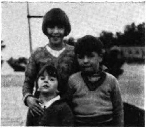  picture of a man reading papers spread out in front of him