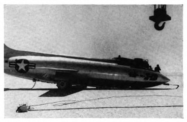 An airplane on the ground with its nose down