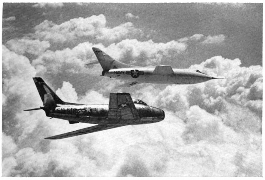 Two airplanes flying, a larger round-nosed plane somewhat lower than a plane with a pointed nose