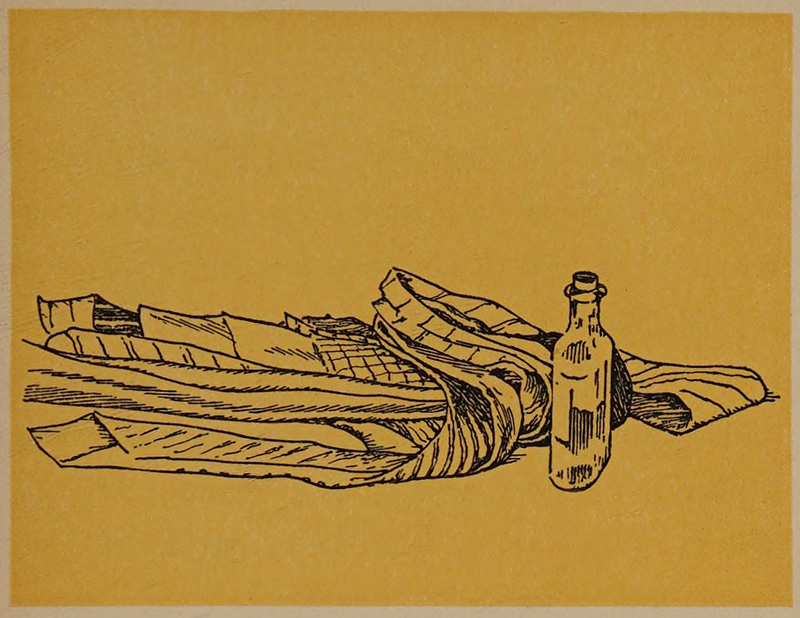 A pile of ties and a small vial