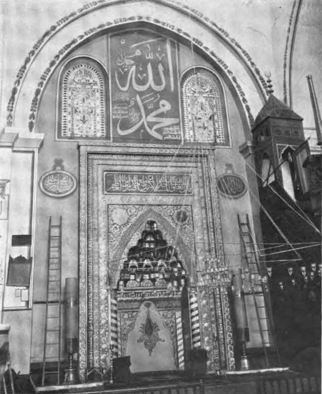 This appears to be a photo of the interior door and surroundings of the mosque as described in the text.