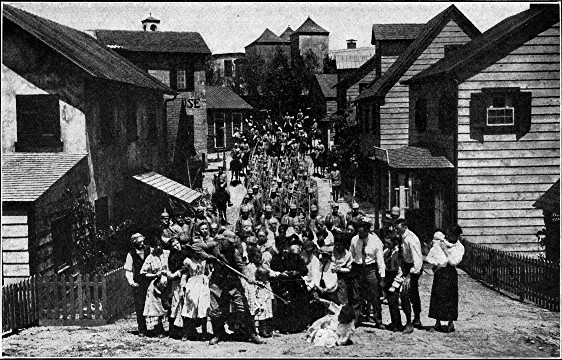 &copy;Famous Players&mdash;Lasky Corporation. Scene from the
Photo-Play

THE HUN COMES TO TOWN.
