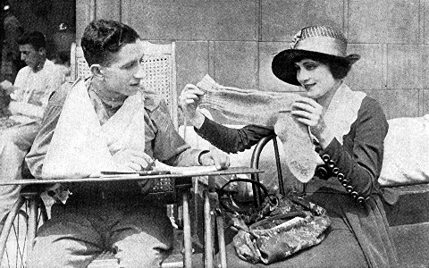 &copy;Famous Players&mdash;Lasky Corporation. Scene from the
Photo-Play

"THEY LOOK BIG ENOUGH, DON'T THEY?"