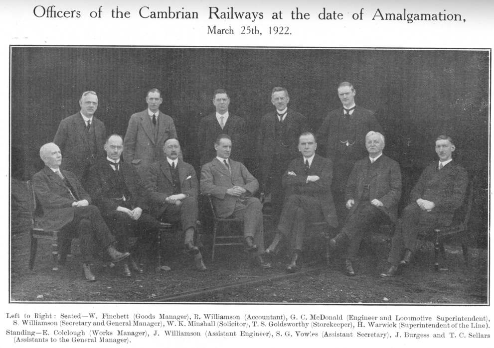 Officers of the Cambrian Railways at the date of Amalgamation,
March 25th, 1922.  Left to Right: Seated&mdash;W. Finchett (Goods Manager),
R. Williamson (Accountant), G. C. McDonald (Engineer and Locomotive
Superintendent), S. Williamson (Secretary and General Manager), W. K.
Minshall (Solicitor), T. S. Goldsworthy (Storekeeper), H. Warwick
(Superintendent of the Line).  Standing&mdash;E. Colclough (Works Manager),
J. Williamson (Assistant Engineer), S. G. Vowles (Assistant Secretary), J.
Burgess and T. C. Sellars (Assistants to the General Manager)