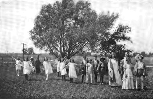 The swiftly awakening artistic energies of the Country
Girl are finding an outlet in the new national interest in pageantry.
The farm, meadow or field makes an ideal stage.