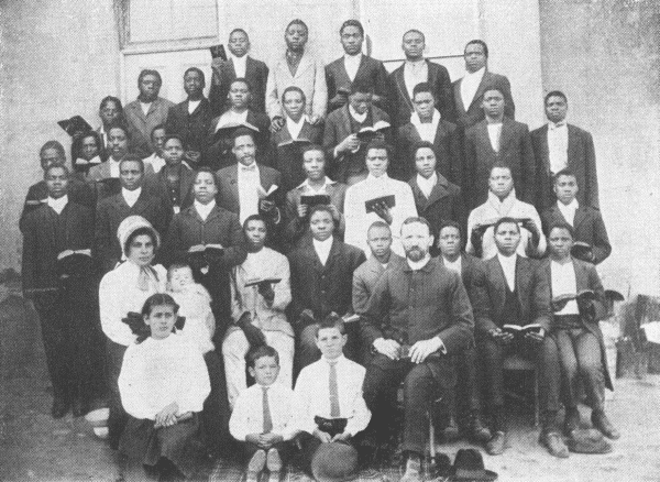 Mr. and Mrs. Isaac O. Lehman and Family and Some of Our Workers, Members
and Enquirers. Nos. 1, 2, 3, 4, 5 and 6 Are Satisfactorily Engaged in
Work and in Preparation for the Work as Evangelists.