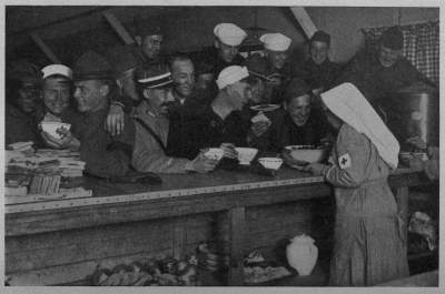 SUPPER HOUR AT BORDEAUX
No matter what hour; always the gobs and buddies&mdash;other armies as well as our own&mdash;ready
with 100 per cent appetites