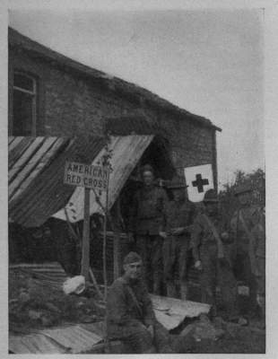 OUR RED CROSS AT THE FRONT
A typical A. R. C. dugout just behind the lines