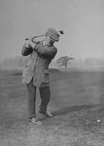 PLATE V.

J. H. TAYLOR

At the top of his swing in the drive. Note here the position of
Taylor's wrists. This is a matter of the utmost importance. Taylor is
at times inclined to get a little on to his right leg, but probably
here the weight is at least equally distributed, if not mainly on the
left.