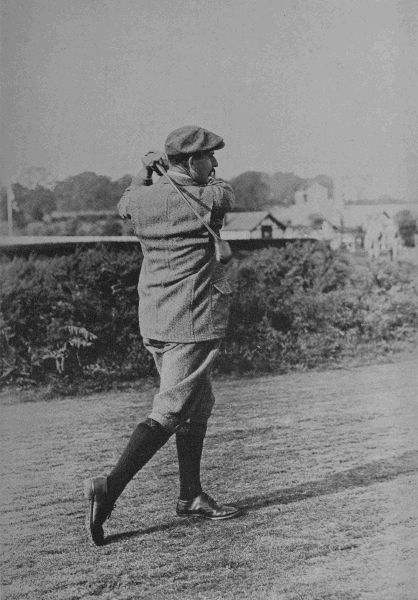 PLATE VII.

HARRY VARDON

The finish of the drive&mdash;a little later than in Plate VI., showing the
weight completely on the left foot.