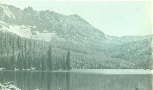 Fig. 15.&mdash;Strawberry Lake, the glaciated valley of Strawberry Creek, and cirque walls formed by the Strawberry volcanic plug.